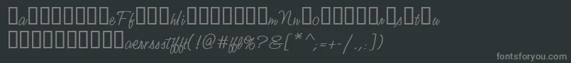 Fonte StudioScriptAltTwoItcTt – fontes cinzas em um fundo preto