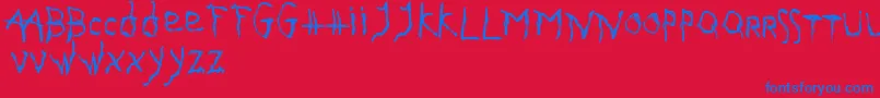 GothikaIssueA Font – Blue Fonts on Red Background