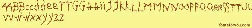 GothikaIssueA Font – Brown Fonts on Yellow Background