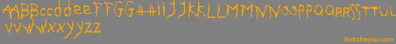 GothikaIssueA Font – Orange Fonts on Gray Background