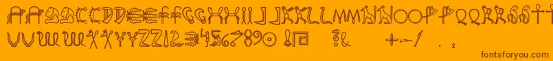 Fakeglyph-fontti – ruskeat fontit oranssilla taustalla