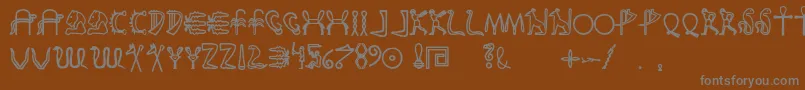 Fakeglyph-Schriftart – Graue Schriften auf braunem Hintergrund