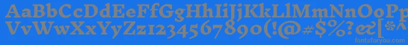 InknutantiquaExtrabold-fontti – harmaat kirjasimet sinisellä taustalla