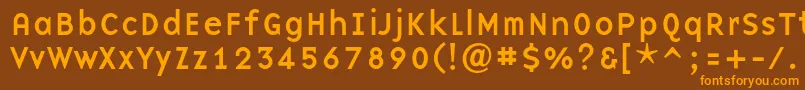 フォントBaseninec – オレンジ色の文字が茶色の背景にあります。