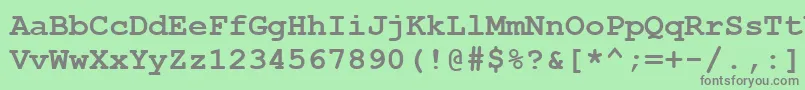 CourierNewCeBold-fontti – harmaat kirjasimet vihreällä taustalla