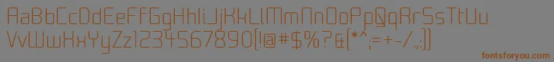 フォントMoon00 – 茶色の文字が灰色の背景にあります。