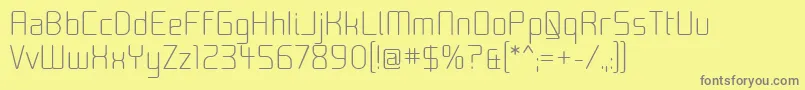 Moon00-fontti – harmaat kirjasimet keltaisella taustalla