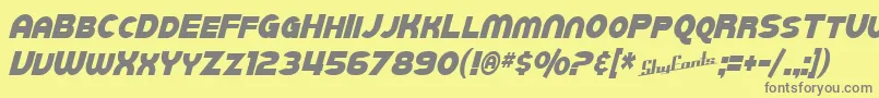SfJuggernautCondensedItalic-fontti – harmaat kirjasimet keltaisella taustalla