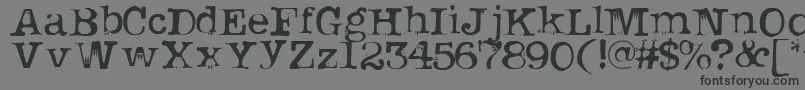 フォントUknowjack – 黒い文字の灰色の背景