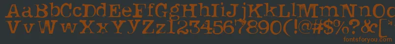 Uknowjack-fontti – ruskeat fontit mustalla taustalla