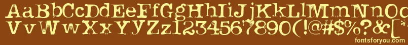Uknowjack-fontti – keltaiset fontit ruskealla taustalla