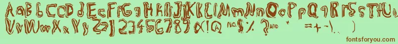 Trulogik Font – Brown Fonts on Green Background