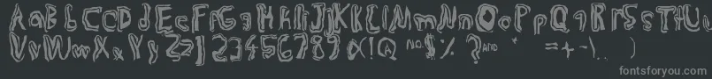 Trulogik Font – Gray Fonts on Black Background