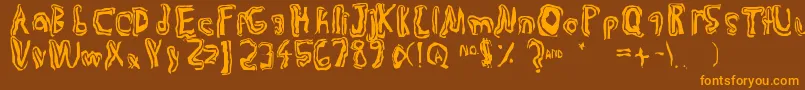 Trulogik-fontti – oranssit fontit ruskealla taustalla