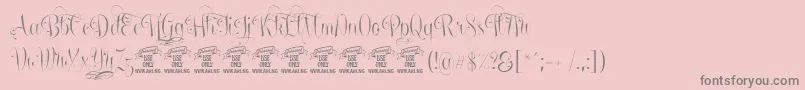 Lisätietoja UndergonePersonaluse-fontista UndergonePersonaluse-fontti – harmaat kirjasimet vaaleanpunaisella taustalla