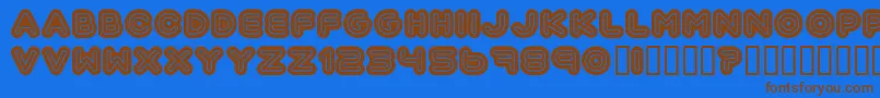 フォントAutomania – 茶色の文字が青い背景にあります。