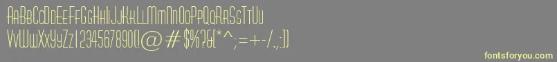 Шрифт AHuxleycaps – жёлтые шрифты на сером фоне