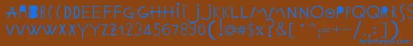 EthnicabcRegular Font – Blue Fonts on Brown Background
