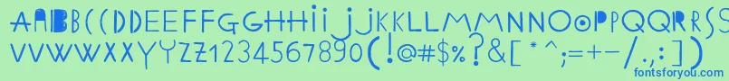 EthnicabcRegular Font – Blue Fonts on Green Background