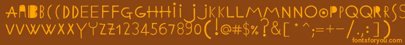 EthnicabcRegular-Schriftart – Orangefarbene Schriften auf braunem Hintergrund