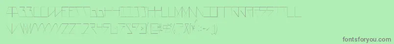 AsteriskThinlaser-fontti – harmaat kirjasimet vihreällä taustalla