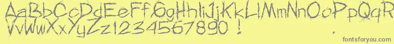 MnfRejormMay-Schriftart – Graue Schriften auf gelbem Hintergrund