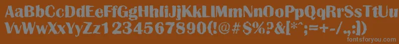 Czcionka GrenoblerandomXboldRegular – szare czcionki na brązowym tle