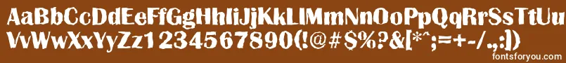 GrenoblerandomXboldRegular-fontti – valkoiset fontit ruskealla taustalla