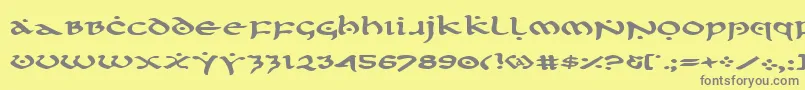 フォントFirstv2e – 黄色の背景に灰色の文字