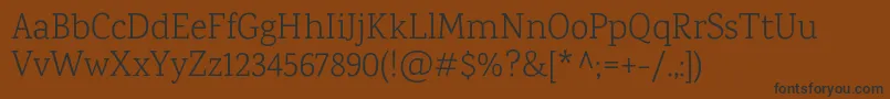 KarmaLight Font – Black Fonts on Brown Background