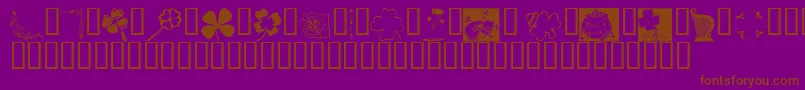 フォントKrIrishKat3 – 紫色の背景に茶色のフォント