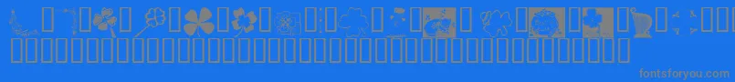 KrIrishKat3-fontti – harmaat kirjasimet sinisellä taustalla