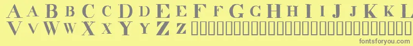 Decindar-Schriftart – Graue Schriften auf gelbem Hintergrund