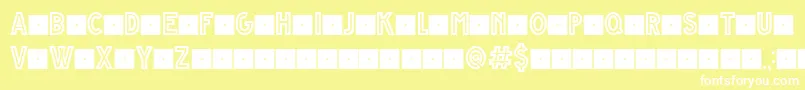 Czcionka GrandeAndrettiRegularV1.0LimitedCharset – białe czcionki na żółtym tle