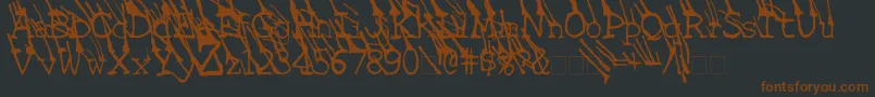 LinotypeGrassyBold-Schriftart – Braune Schriften auf schwarzem Hintergrund