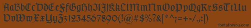 Gotischa Font – Black Fonts on Brown Background