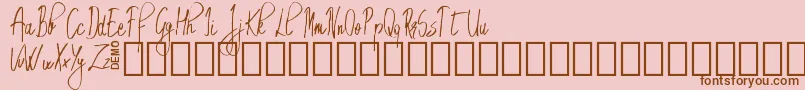 EmrytDemo-Schriftart – Braune Schriften auf rosa Hintergrund