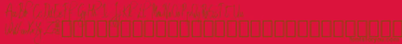 EmrytDemo-fontti – ruskeat fontit punaisella taustalla