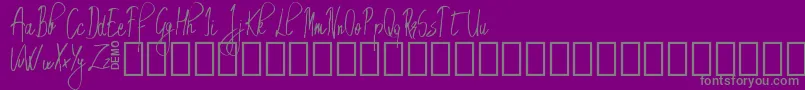 EmrytDemo-fontti – harmaat kirjasimet violetilla taustalla