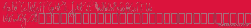 Шрифт EmrytDemo – серые шрифты на красном фоне