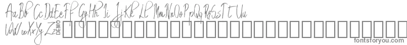 EmrytDemo-fontti – harmaat kirjasimet valkoisella taustalla