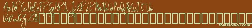 EmrytDemo-fontti – vihreät fontit ruskealla taustalla
