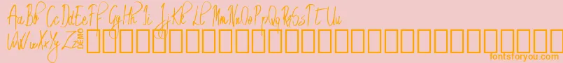 EmrytDemo-Schriftart – Orangefarbene Schriften auf rosa Hintergrund