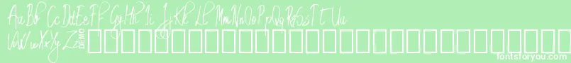 Шрифт EmrytDemo – белые шрифты на зелёном фоне