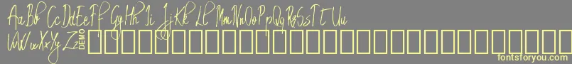 EmrytDemo-fontti – keltaiset fontit harmaalla taustalla