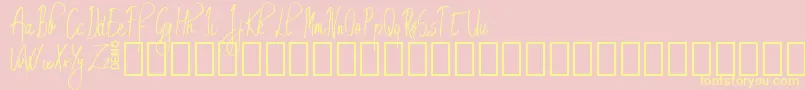 Шрифт EmrytDemo – жёлтые шрифты на розовом фоне