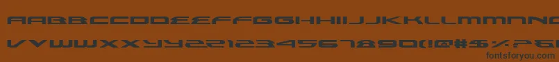 フォントAlexisExpanded – 黒い文字が茶色の背景にあります