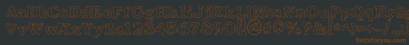 Seismacrap Font – Brown Fonts on Black Background