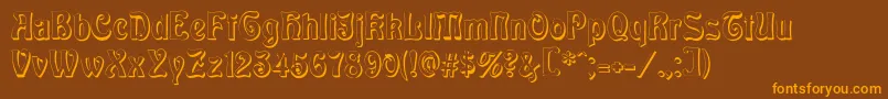 フォントBaldurShadow – オレンジ色の文字が茶色の背景にあります。
