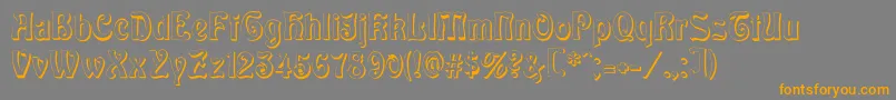 フォントBaldurShadow – オレンジの文字は灰色の背景にあります。